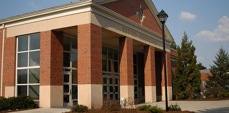 Exterior of Charles B. Degenstein Campus Center with sunny, blue sky above